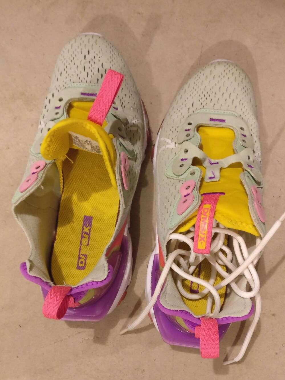 Nike Women's Mint Green Sneakers with Yellow, Pink & Purple Accents